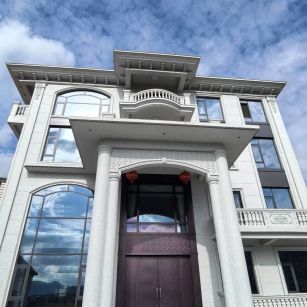 安庆白麻别墅外墙干挂石材效果示例