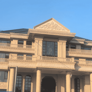 安庆黄金麻别墅外墙干挂石材效果示例