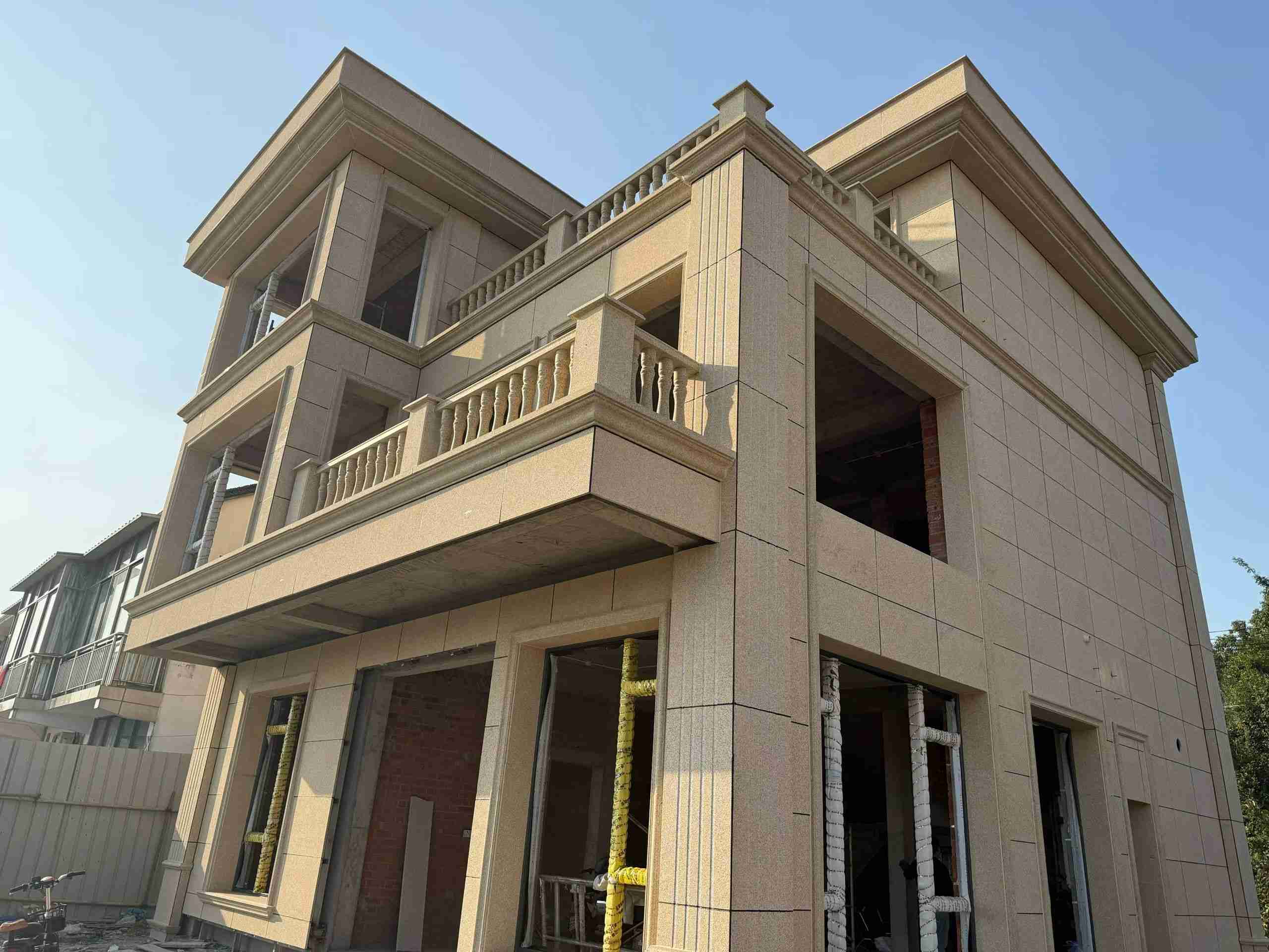 安庆 黄金麻花岗岩石材荔枝面外墙干挂效果展示